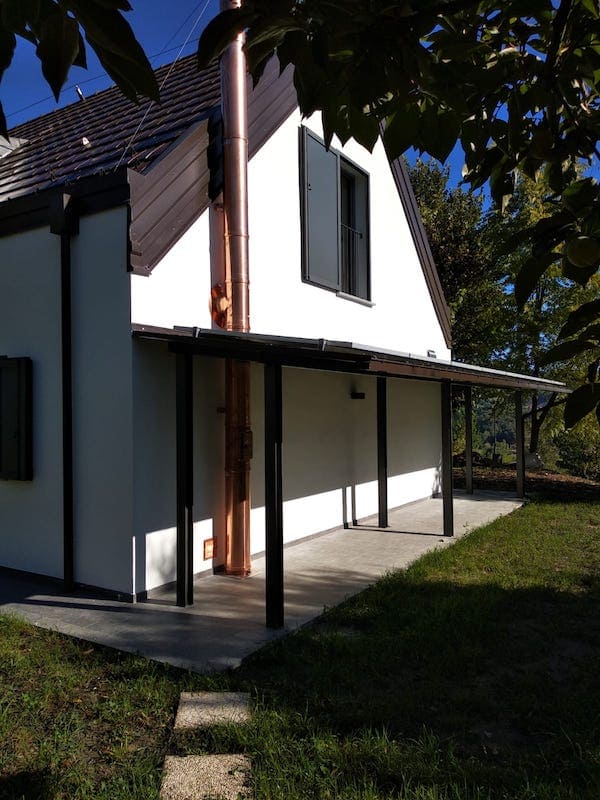 Bioedilizia legno paglia torino, casa finita vista dal giardino