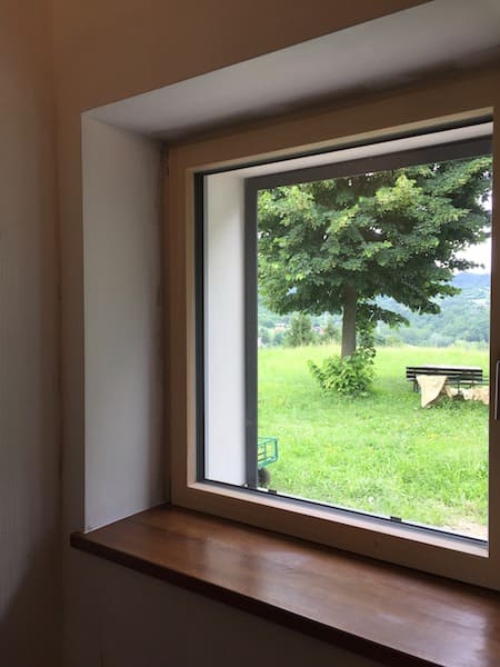 Bioedilizia legno paglia torino, casa finita vista dal giardino