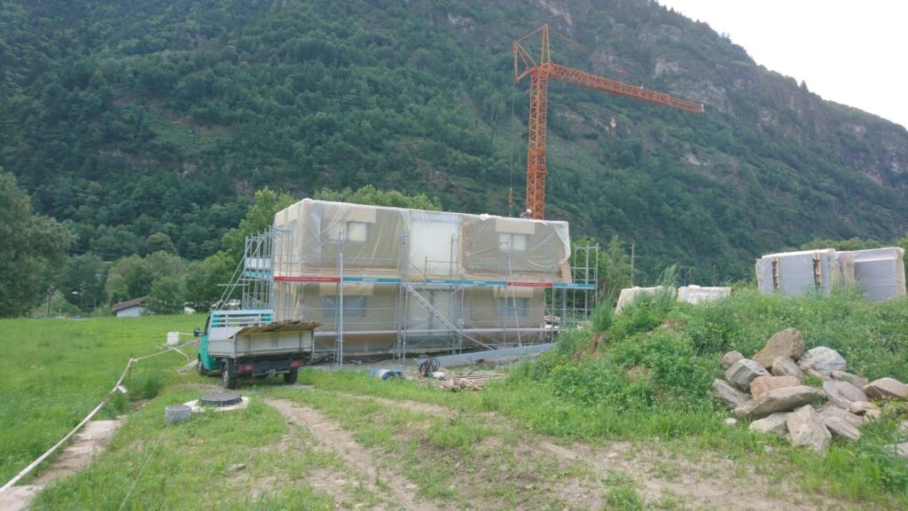 casa in legno tre piani canton ticino