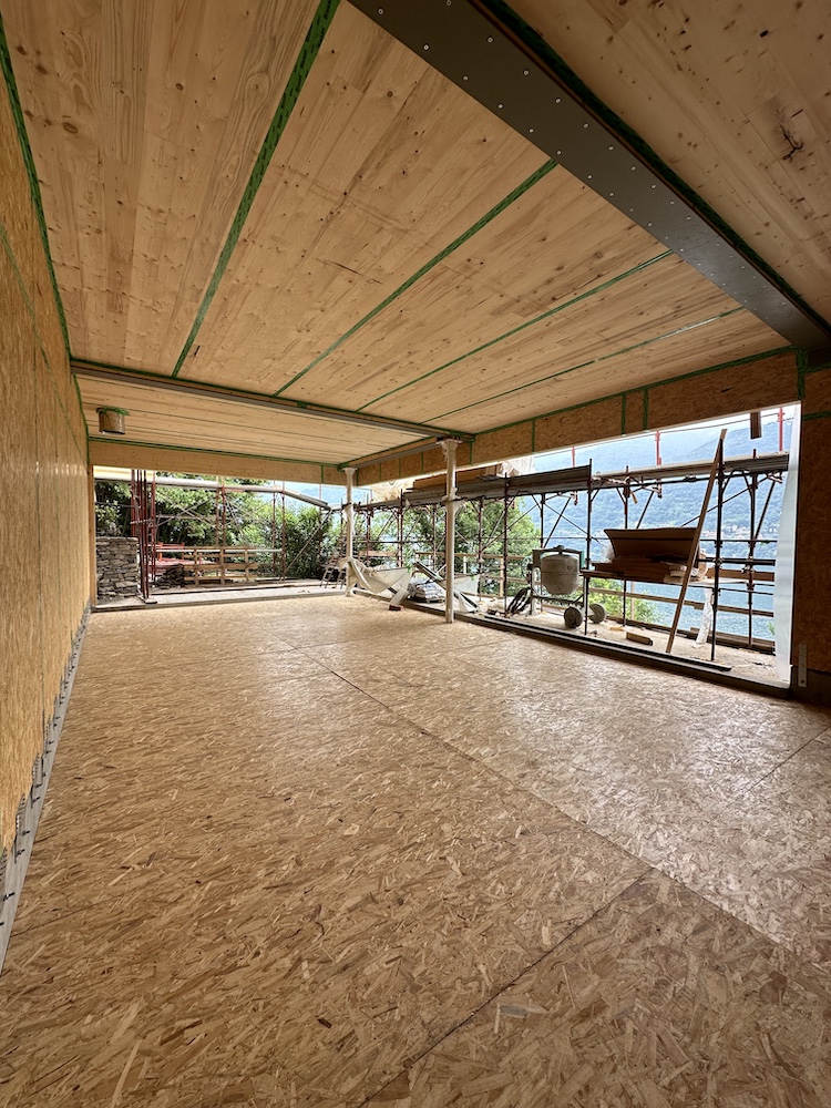 villa in legno e lolla di riso como a telaio